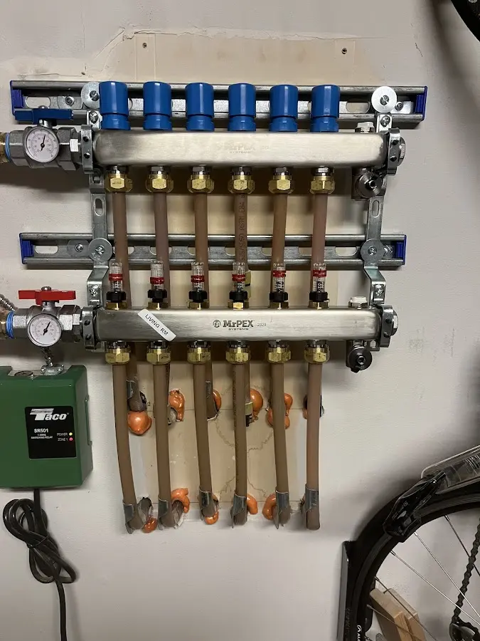 Plumber performing Gas Line Installation at a residential property in Ojus